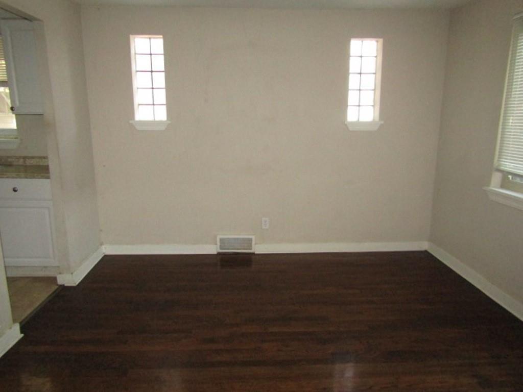 8601 Westwood Road Pittsburgh, PA 15235 - Photo 12 of 28 an empty room with wooden floor and windows