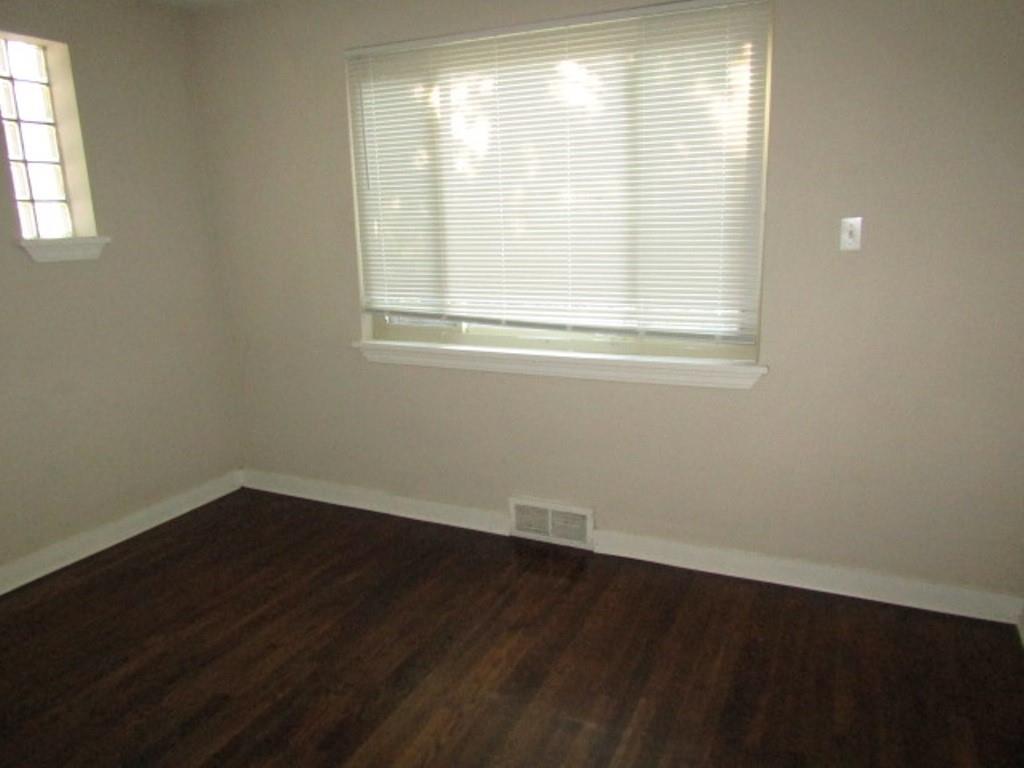 8601 Westwood Road Pittsburgh, PA 15235 - Photo 13 of 28 an empty room with wooden floor and windows