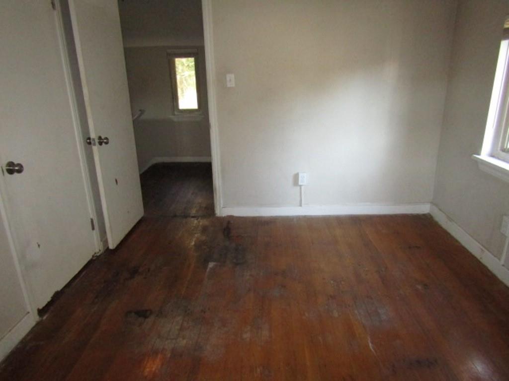 8601 Westwood Road Pittsburgh, PA 15235 - Photo 20 of 28 an empty room with wooden floor and windows