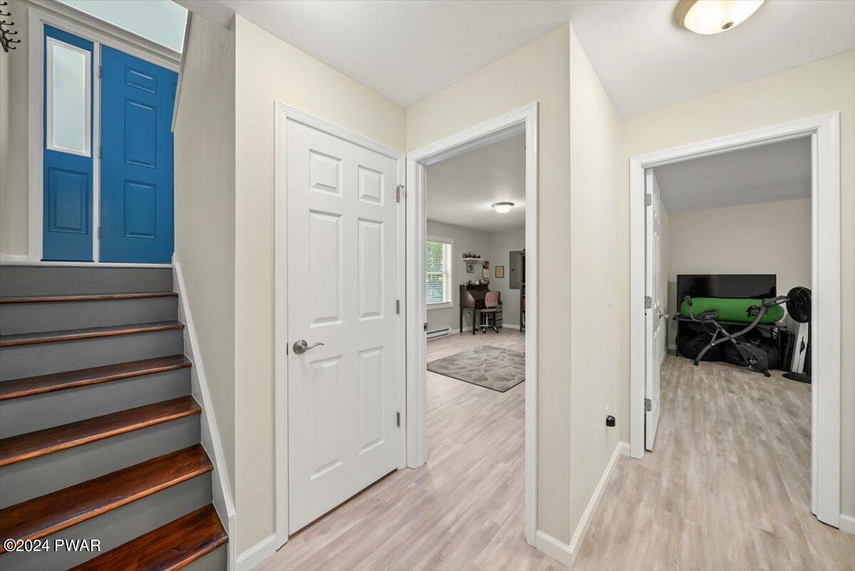 133 Butternut Road Milford, PA 18337 - Photo 18 of 34 a view of a hallway with wooden floor and closet