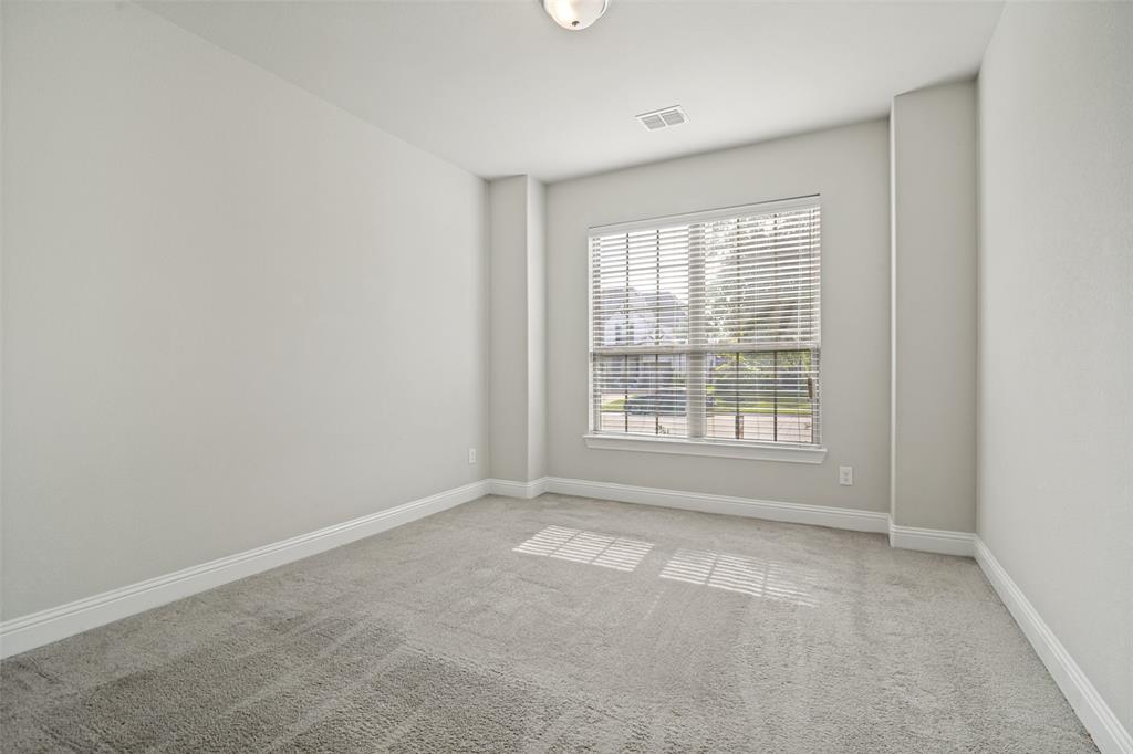 2802 Merlot Circle Rowlett, TX 75088 - Photo 19 of 40 a view of an empty room with a window