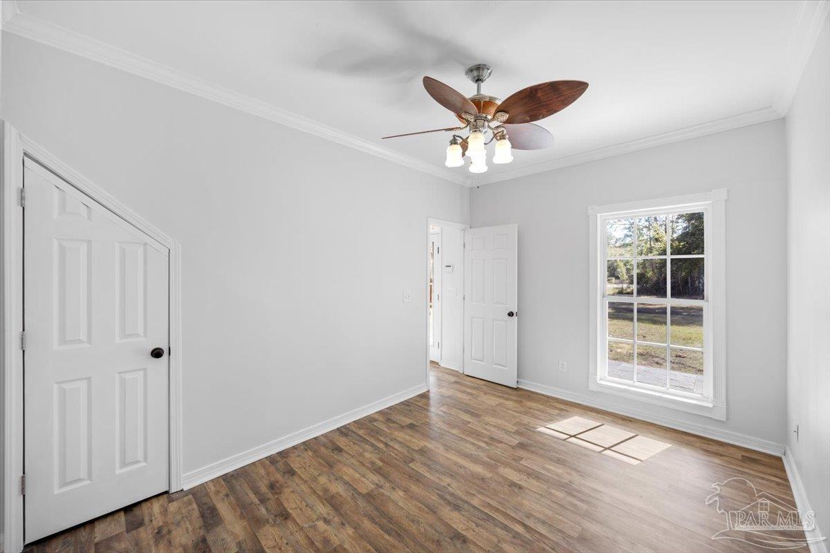2099 Garcon Point Road Milton, FL 32583 - Photo 33 of 65 a view of an empty room with a window