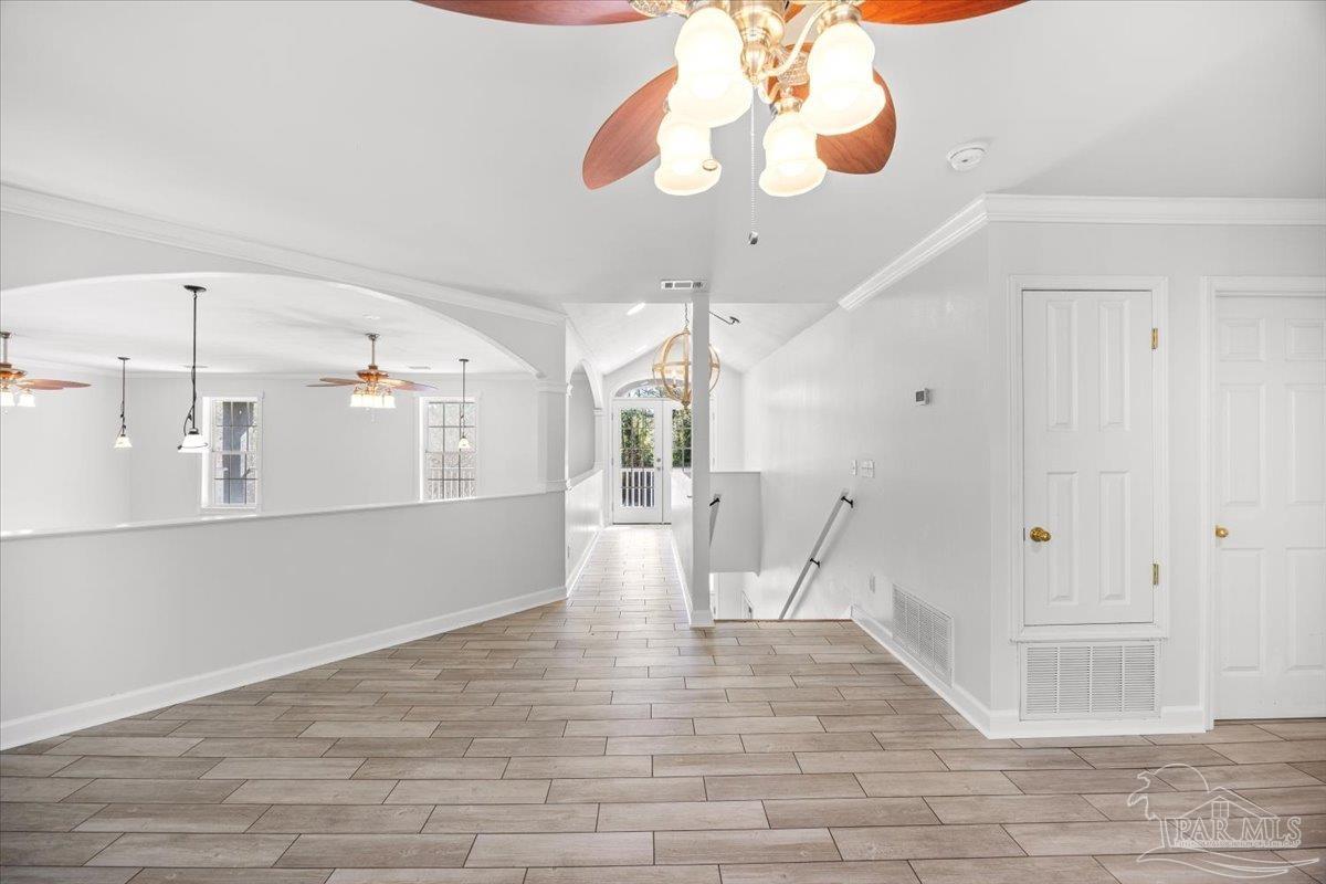 2099 Garcon Point Road Milton, FL 32583 - Photo 38 of 65 a view of an entryway with wooden floor