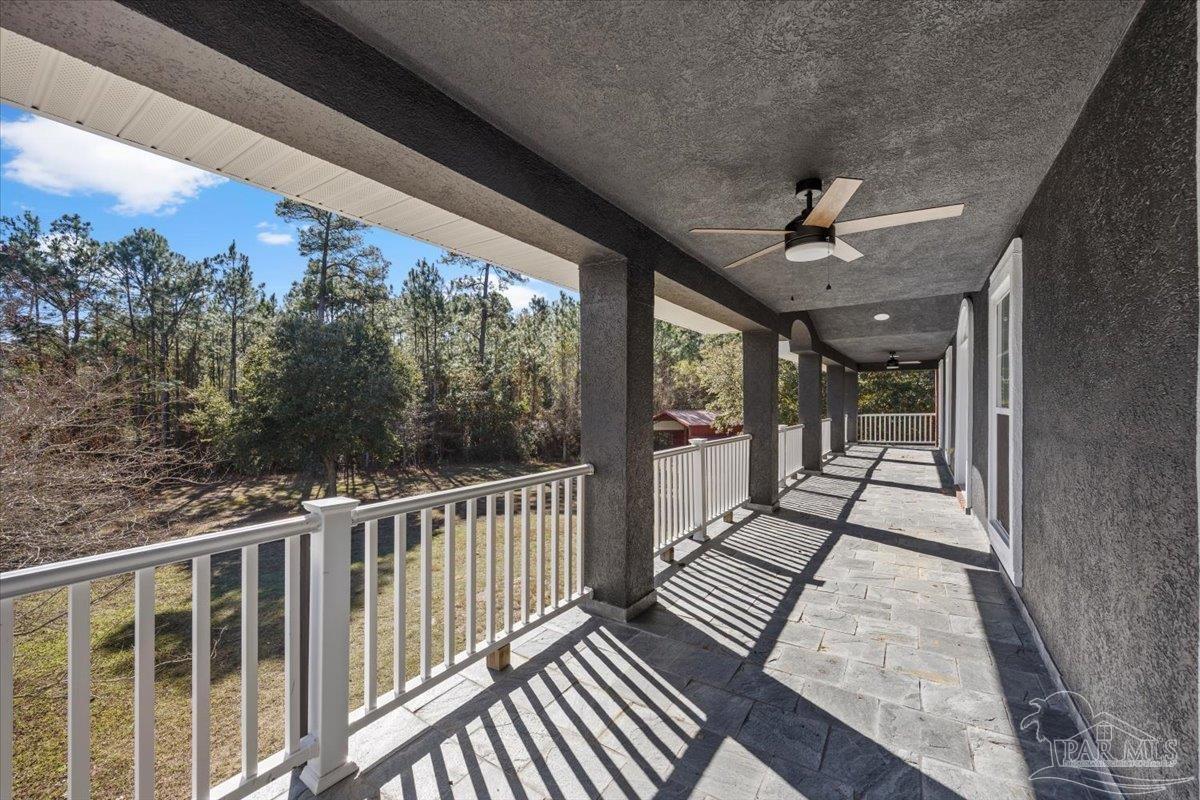 2099 Garcon Point Road Milton, FL 32583 - Photo 53 of 65 a view of a porch