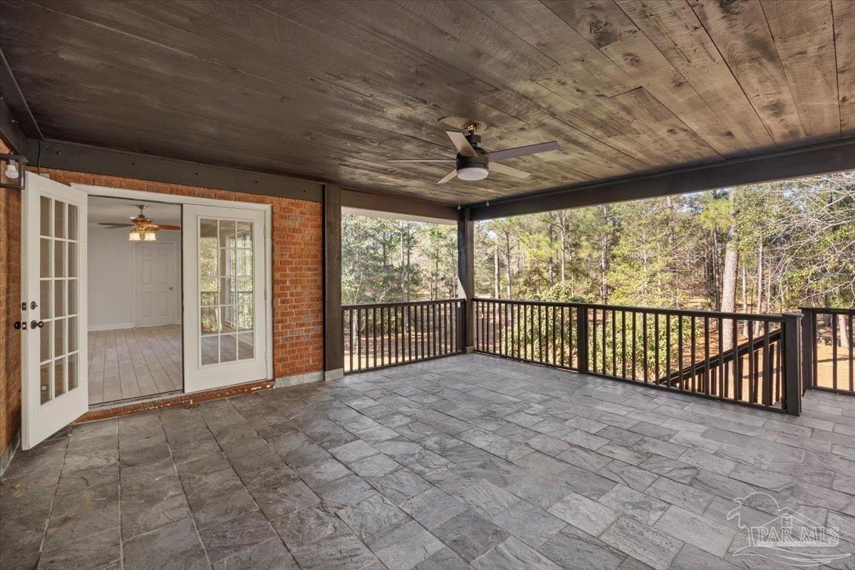 2099 Garcon Point Road Milton, FL 32583 - Photo 55 of 65 a view of an empty room with a large window