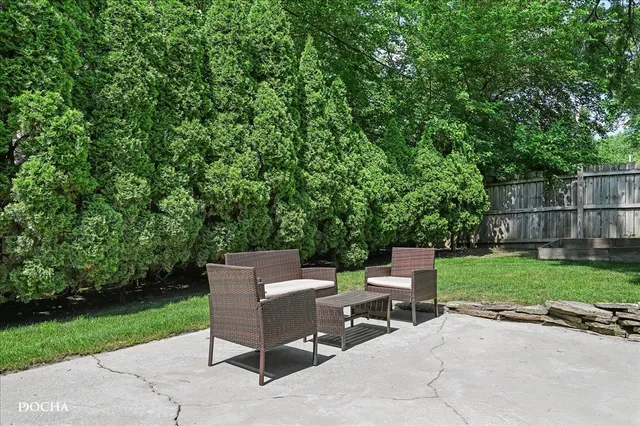 a view of backyard with a garden and plants
