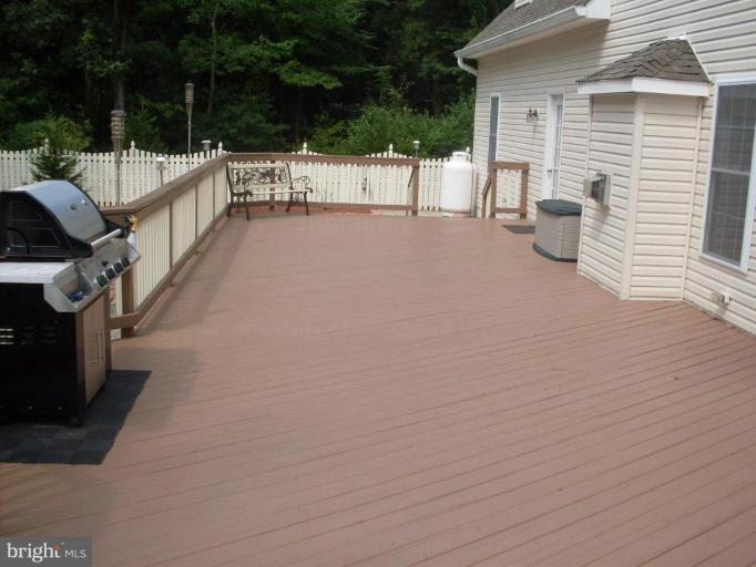 909 Wieker Road Severn, MD 21144 - Photo 2 of 30 45 foot long deck, almost the length of the house