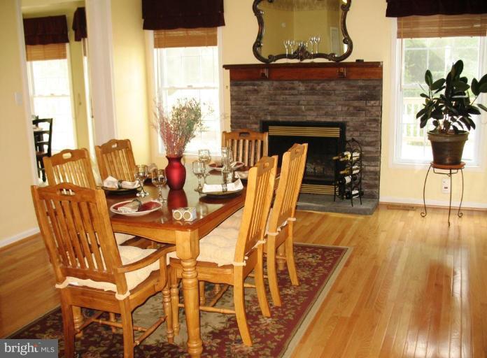 909 Wieker Road Severn, MD 21144 - Photo 14 of 30 This 20' by 13' Dining Room has a gas fireplace