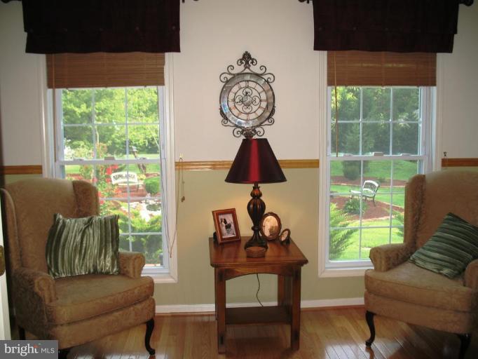 909 Wieker Road Severn, MD 21144 - Photo 15 of 30 Sitting room just outside of the foyer.