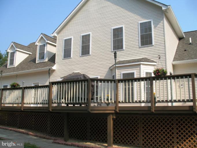 909 Wieker Road Severn, MD 21144 - Photo 16 of 30 The back of the house has a 55' by 20' Deck