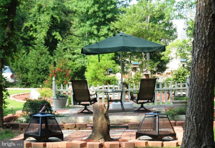 909 Wieker Road Severn, MD 21144 - Photo 17 of 30 Patio is in the yard