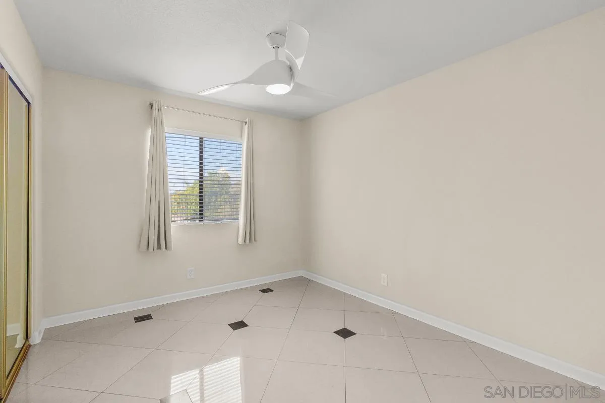404 Summerhill Terrace Alpine, CA 91901 - Photo 13 of 40 a view of an empty room with a window