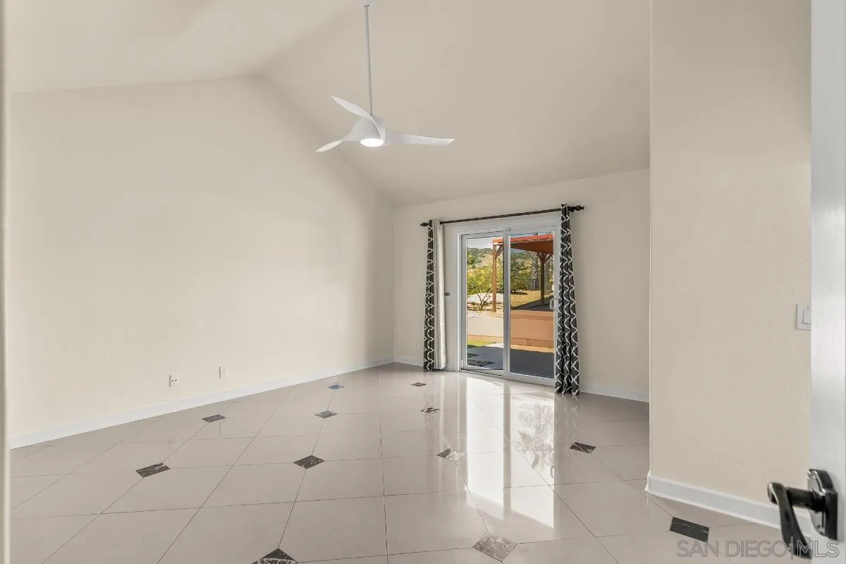 404 Summerhill Terrace Alpine, CA 91901 - Photo 16 of 40 a view of an empty room with a window