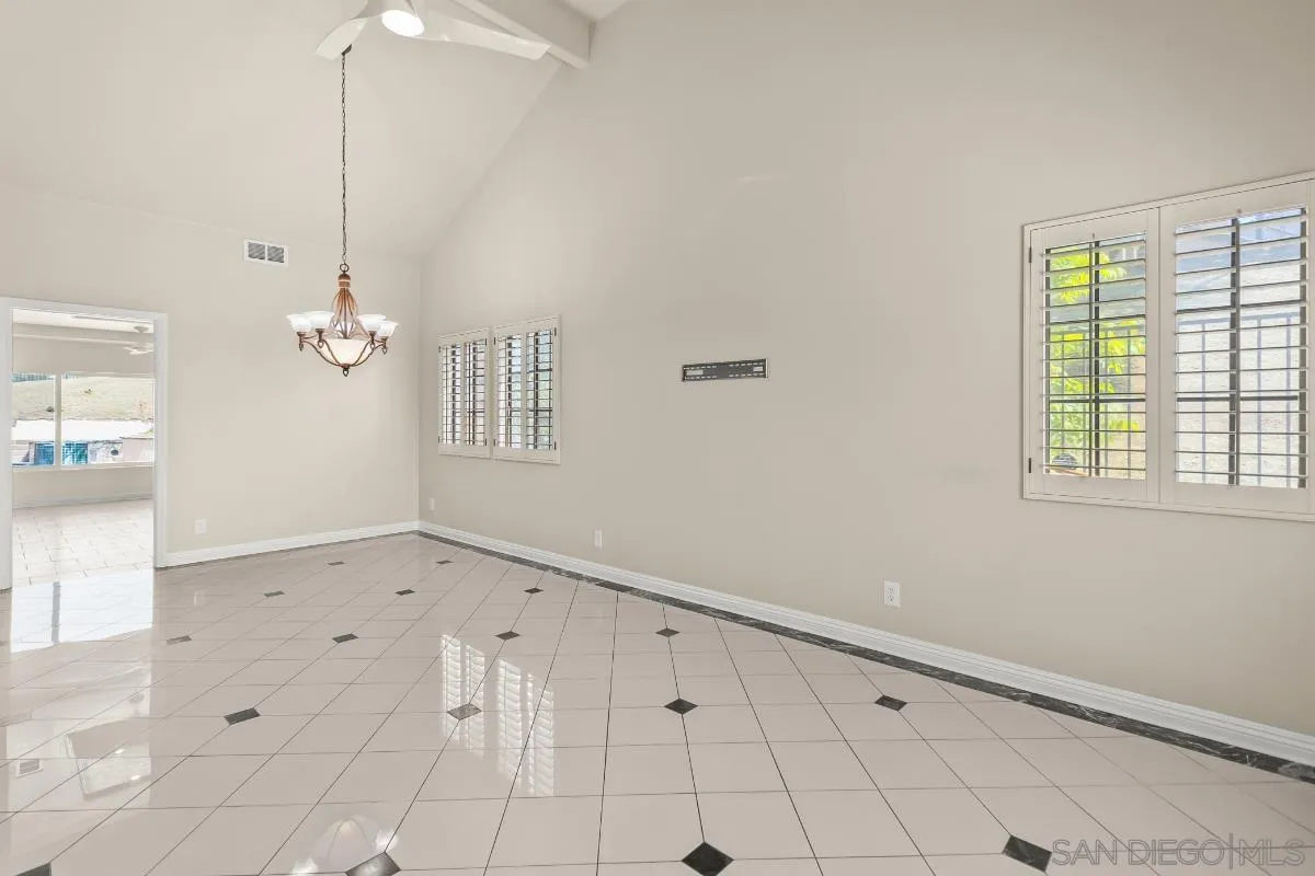 404 Summerhill Terrace Alpine, CA 91901 - Photo 17 of 40 a view of an empty room with a window