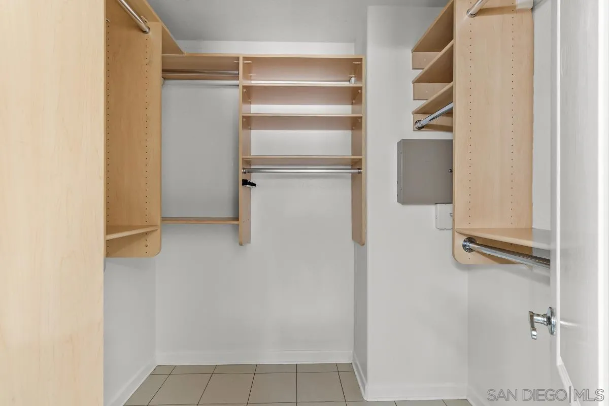 404 Summerhill Terrace Alpine, CA 91901 - Photo 19 of 40 a view of walk in closet with empty racks