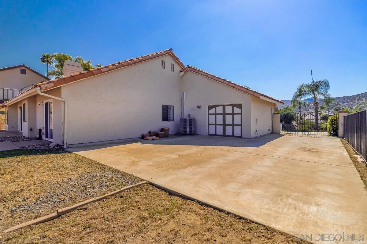 404 Summerhill Terrace Alpine, CA 91901 - Photo 30 of 40 a view of a house with a backyard