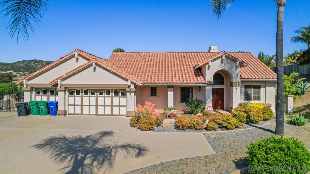 404 Summerhill Terrace Alpine, CA 91901 - Photo 3 of 40 a view of a house with a garden