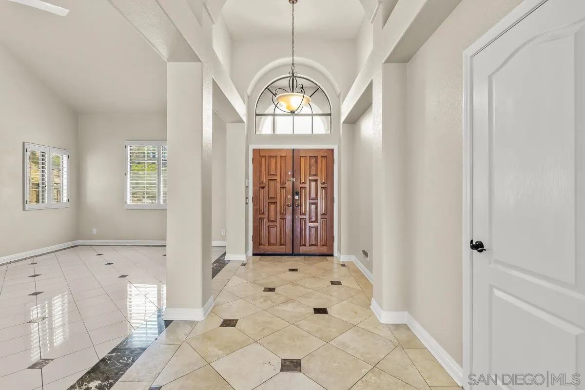 404 Summerhill Terrace Alpine, CA 91901 - Photo 4 of 40 a view of a hallway with windows