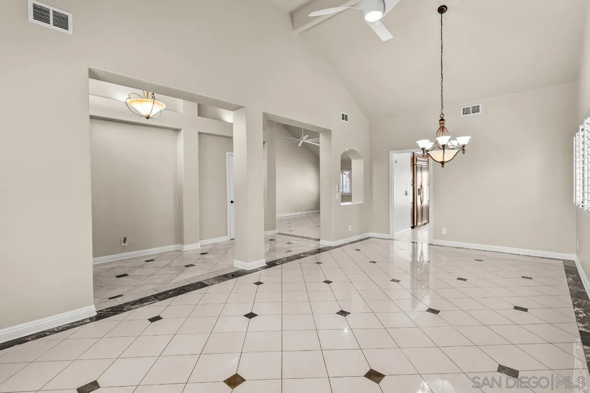 404 Summerhill Terrace Alpine, CA 91901 - Photo 6 of 40 a view of a chandelier fan and entryway