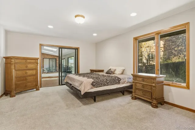 a view of a house with backyard and garden