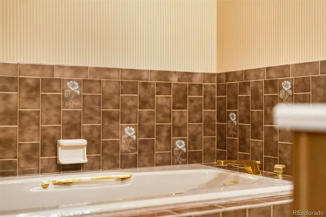 a bedroom with furniture and flat screen tv