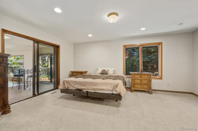 a bathroom with a bathtub and a toilet