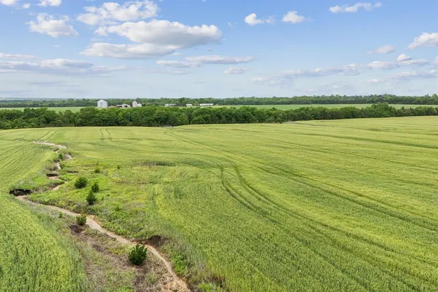 a view of an ocean and mountain