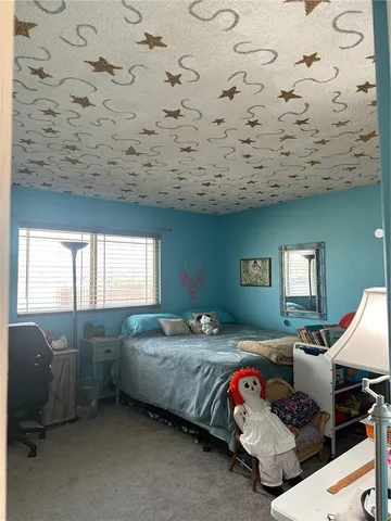 a bathroom with a toilet sink and shower