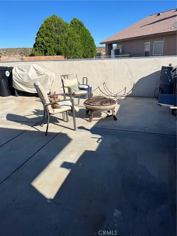 a view of a terrace with chairs