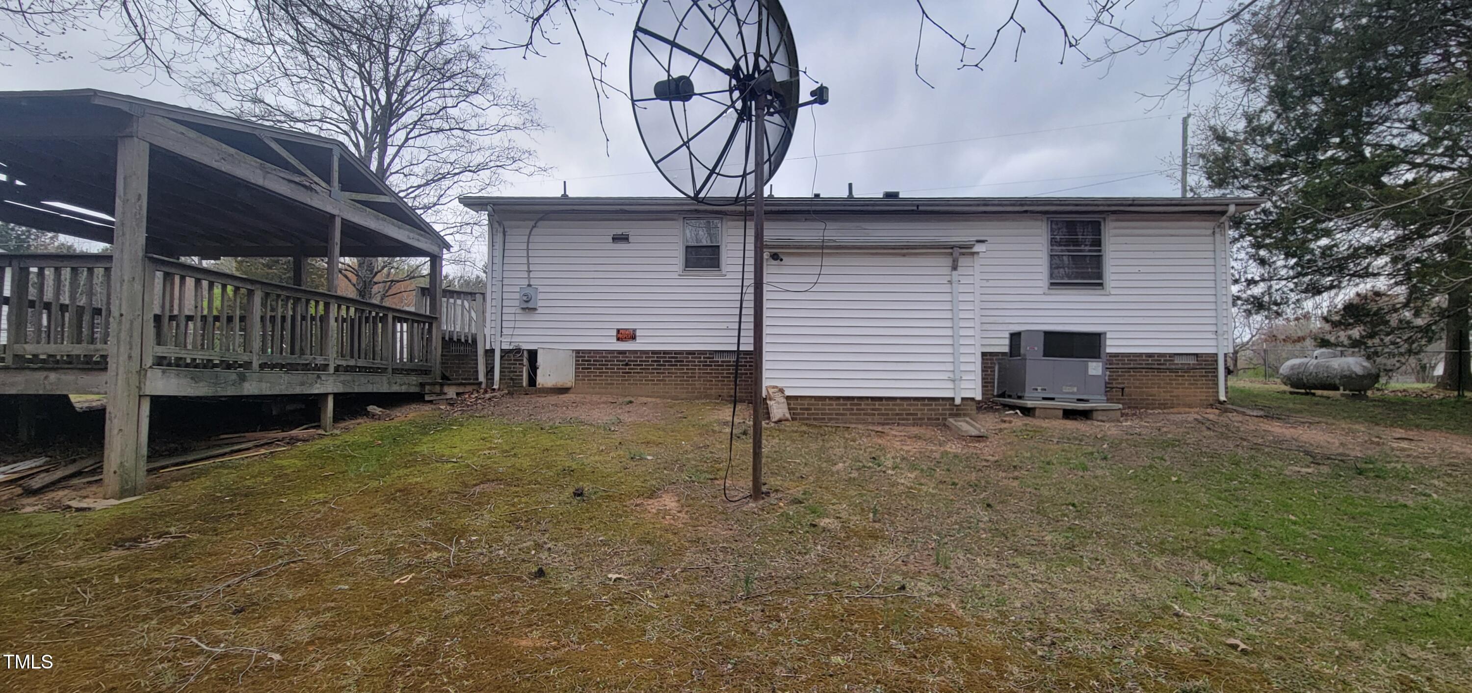 530 Broad Road Roxboro, NC 27573 - Photo 22 of 24 Exterior Rear & Storage Room & Covered Porch
