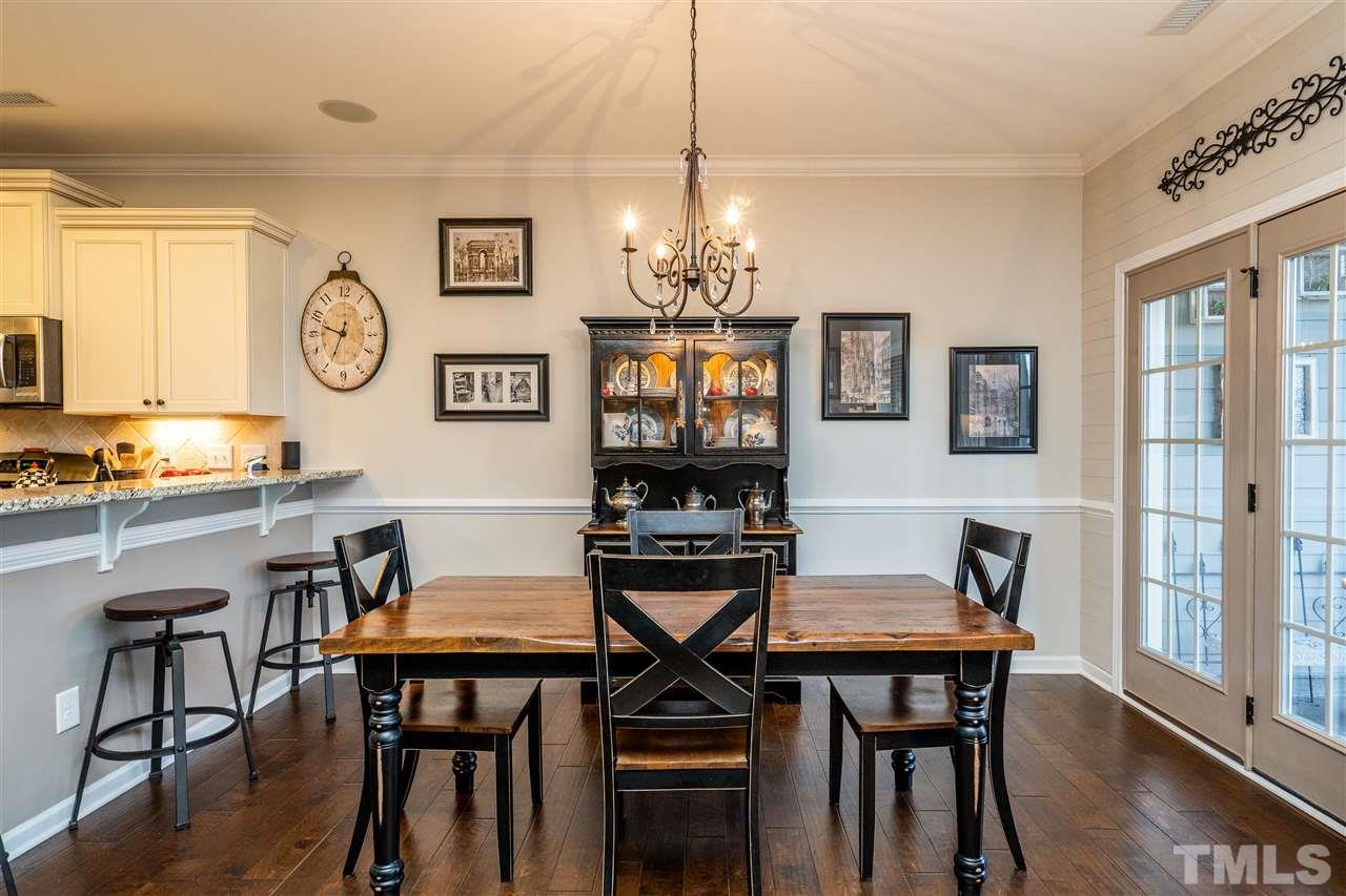 2753 Cypress Point Lane Raleigh, NC 27614 - Photo 8 of 25 Dining Area with doors to screened porch