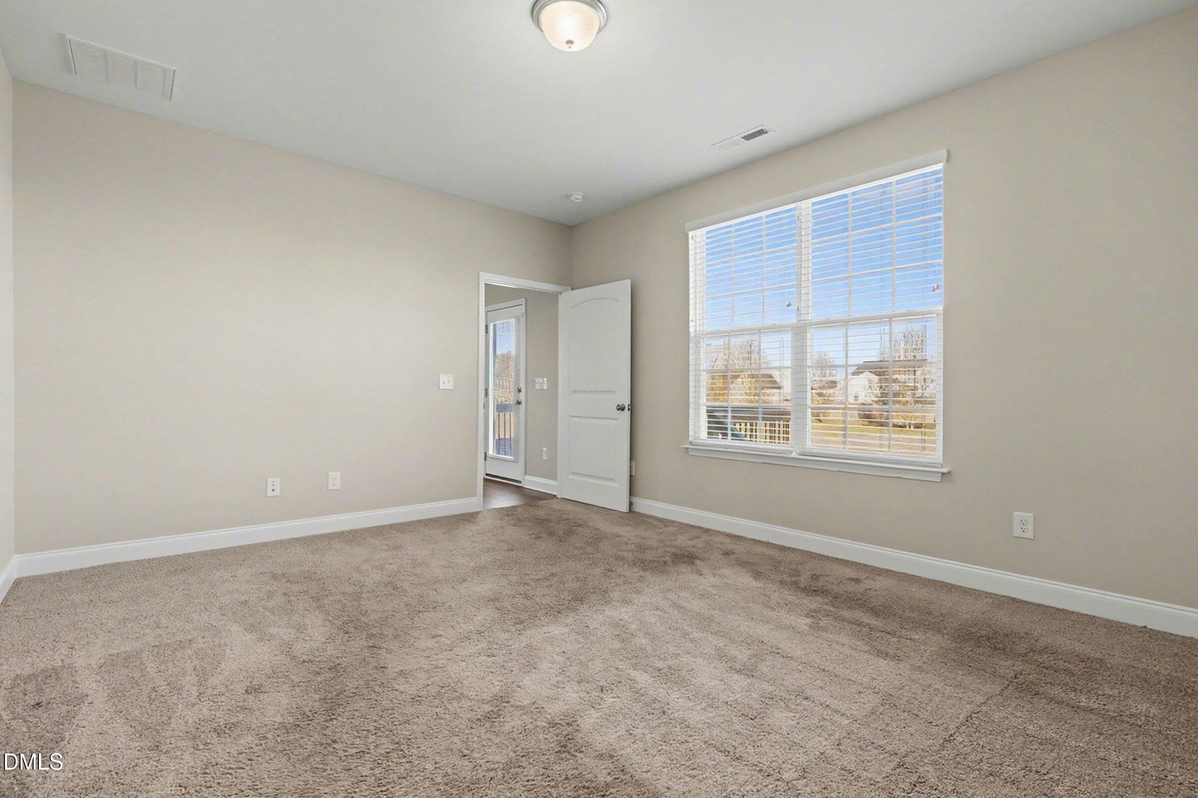 1946 Payne Road Haw River, NC 27258 - Photo 21 of 37 an empty room with windows and closet