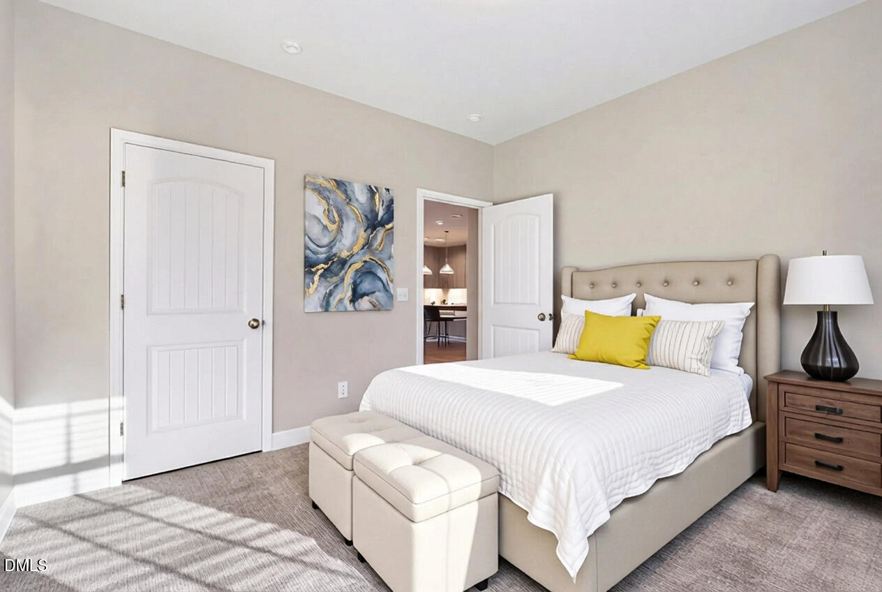 1946 Payne Road Haw River, NC 27258 - Photo 25 of 37 a bedroom with a bed and a lamp