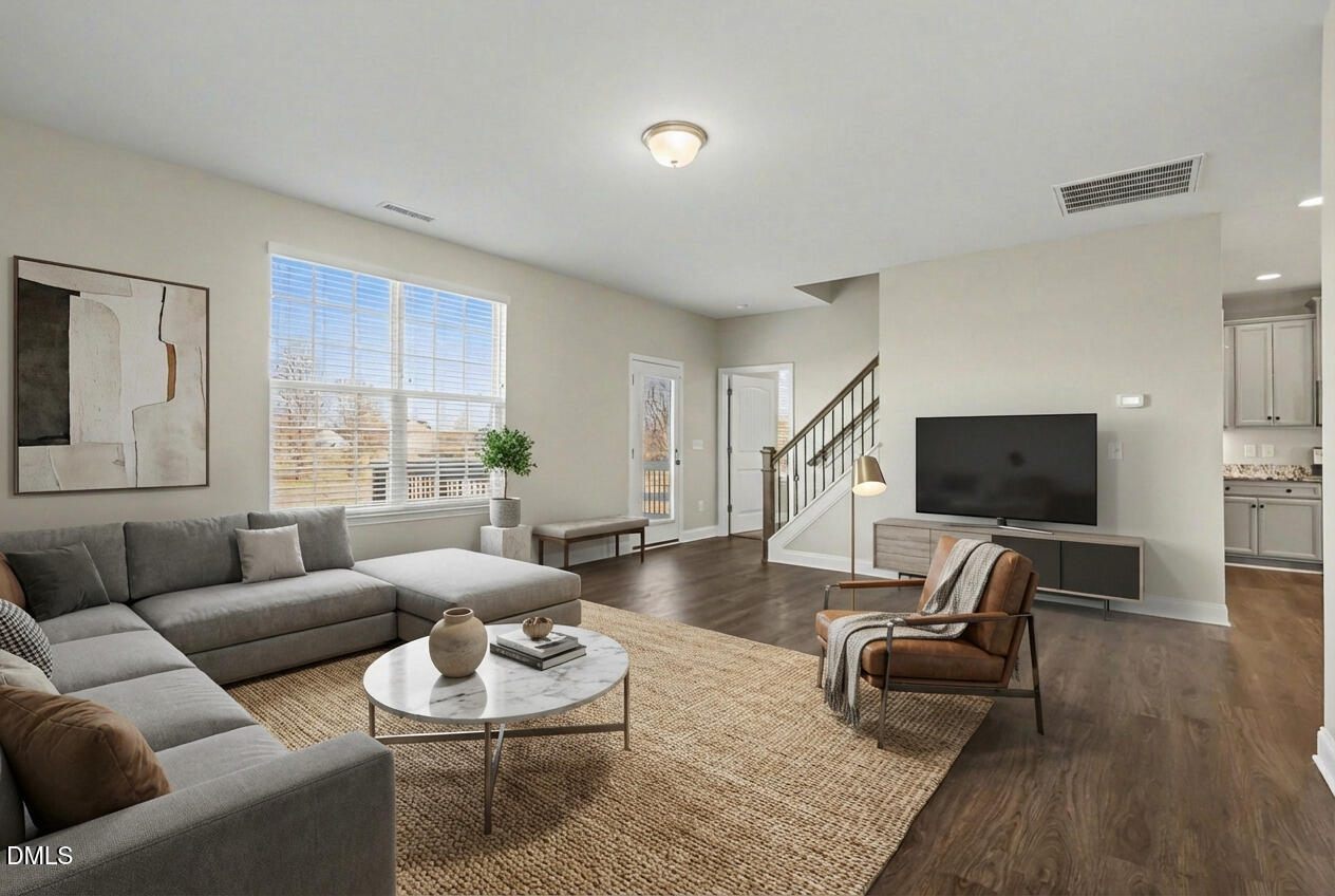 1946 Payne Road Haw River, NC 27258 - Photo 6 of 37 a living room with furniture and a flat screen tv