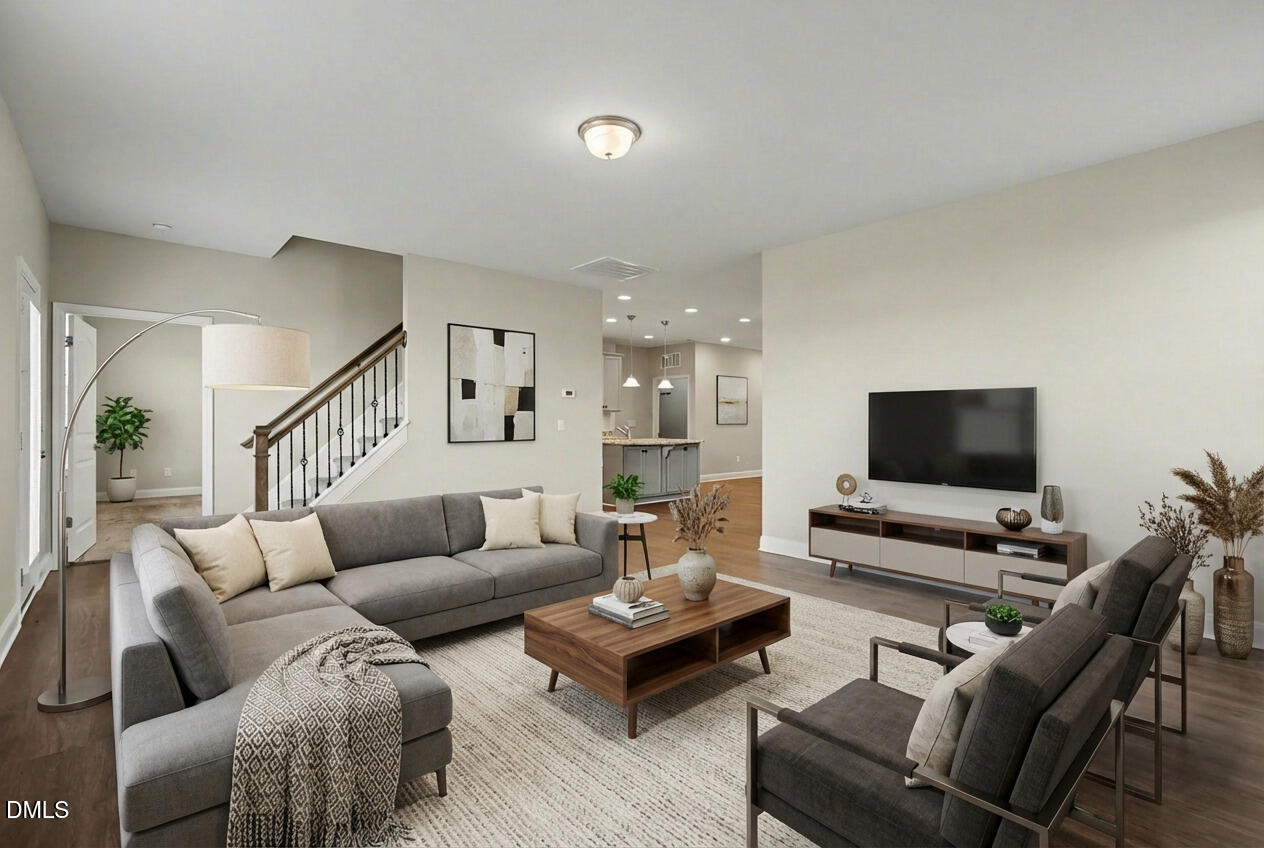 1946 Payne Road Haw River, NC 27258 - Photo 8 of 37 a living room with furniture and a flat screen tv