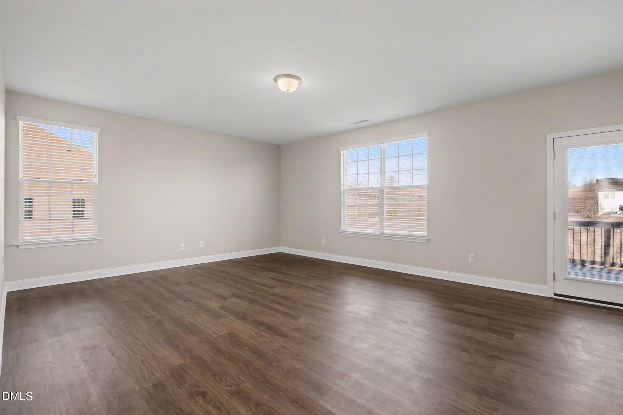 1946 Payne Road Haw River, NC 27258 - Photo 9 of 37 a view of an empty room with wooden floor and a window