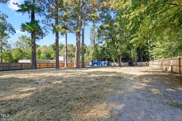 a view of road with trees