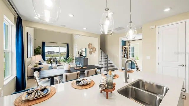 a living room with furniture and a table