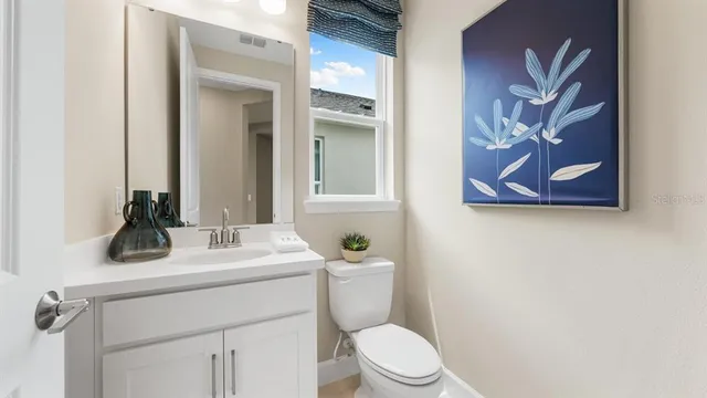 a bed room with a bed and a book shelf