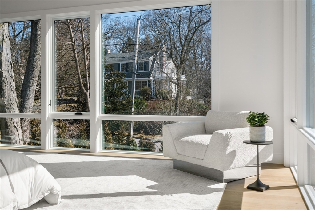 21 White Oak Road Newton, MA 02468 - Photo 20 of 27 a living room with furniture and a large window