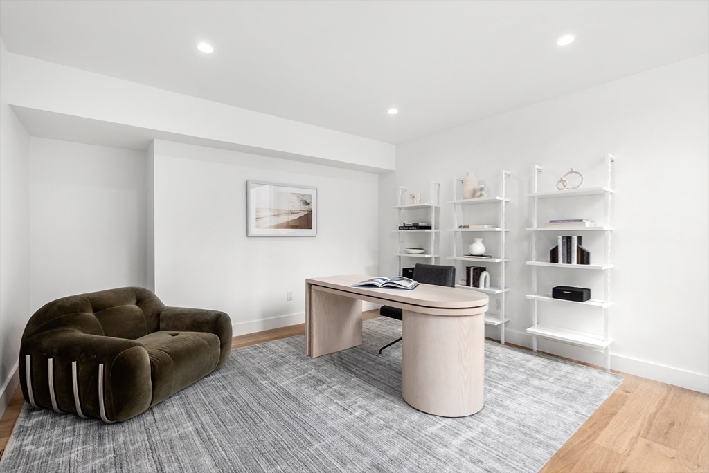 21 White Oak Road Newton, MA 02468 - Photo 21 of 27 a living room with furniture and a table
