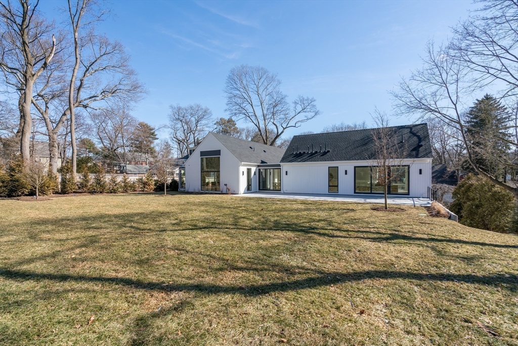 21 White Oak Road Newton, MA 02468 - Photo 23 of 27 a front view of house with yard