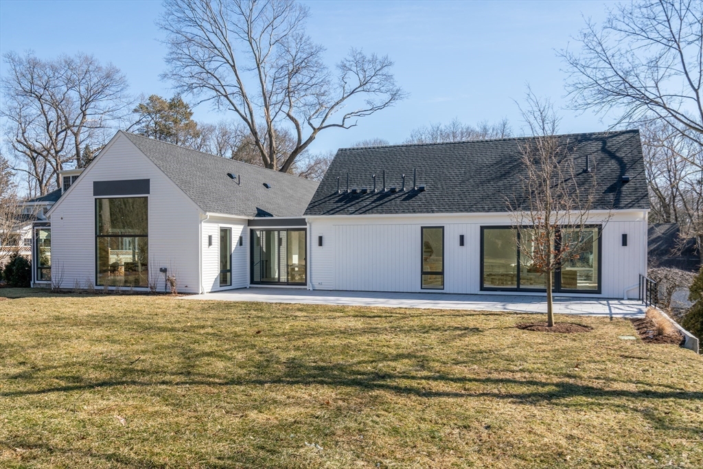 21 White Oak Road Newton, MA 02468 - Photo 24 of 27 a view of a house with a yard