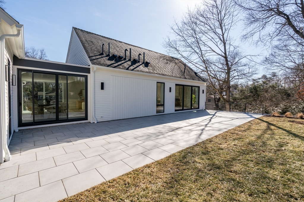 21 White Oak Road Newton, MA 02468 - Photo 26 of 27 a view of a house with a snow