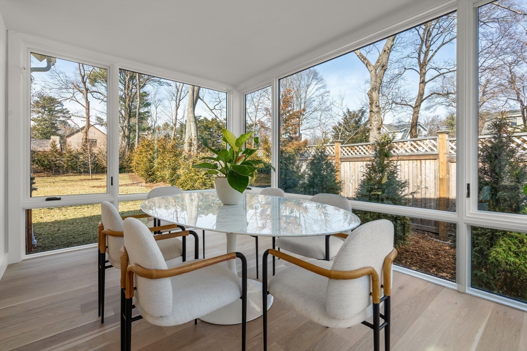 21 White Oak Road Newton, MA 02468 - Photo 3 of 27 a view of a dining room with furniture and a window
