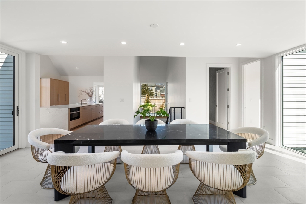 21 White Oak Road Newton, MA 02468 - Photo 7 of 27 a living room with furniture and a large window