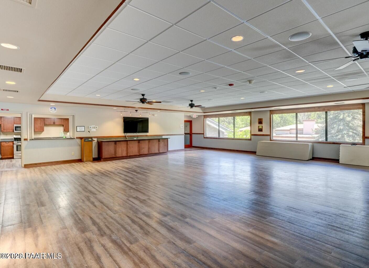 305 Ridge Court Prescott, AZ 86303 - Photo 35 of 35 an empty room with wooden floor and windows