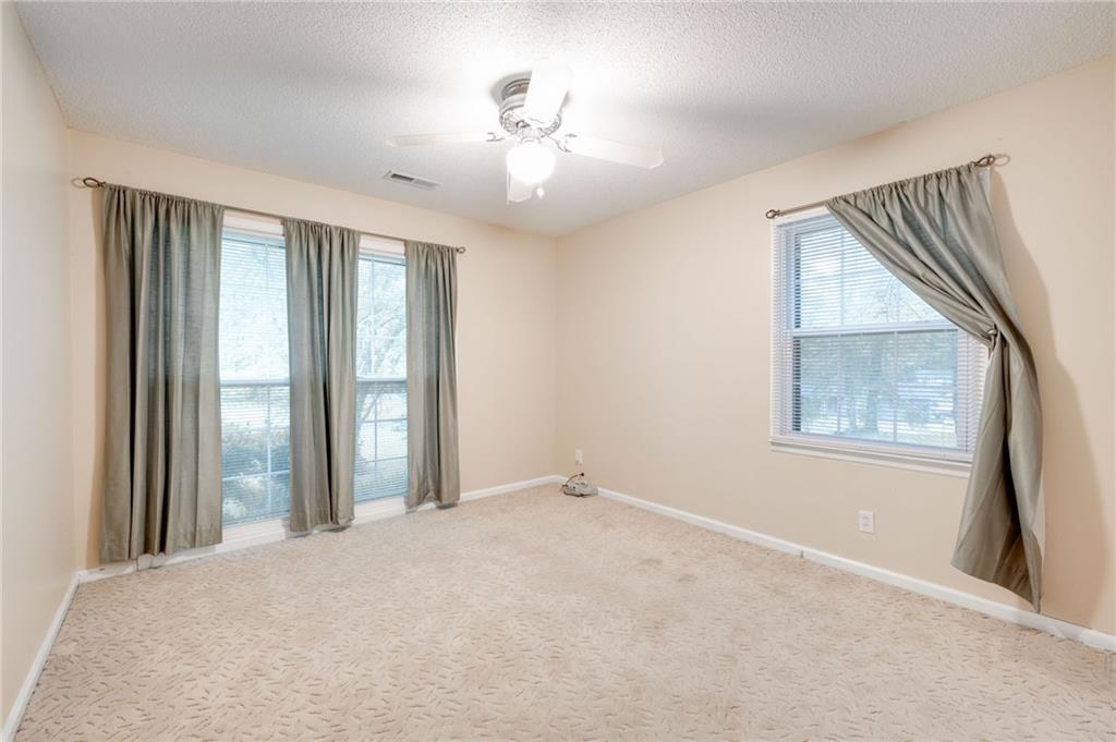 110 Pinewood Way Dalton, GA 30721 - Photo 29 of 35 a view of an empty room with a window