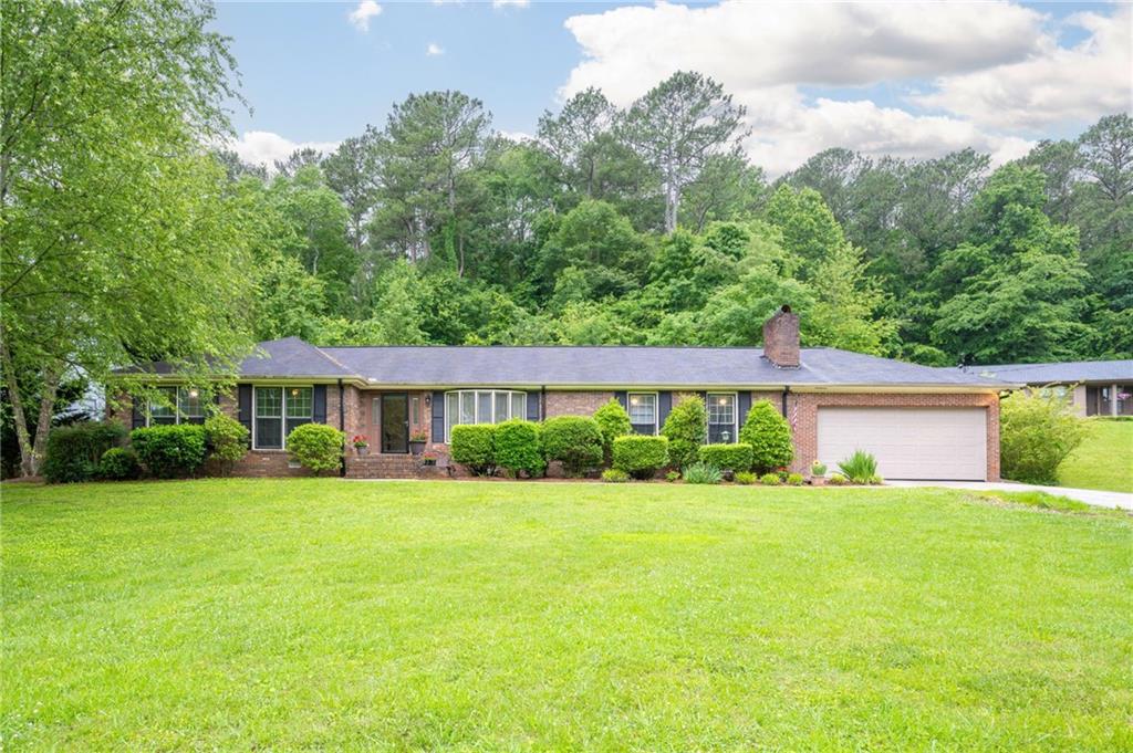 110 Pinewood Way Dalton, GA 30721 - Photo 35 of 35 a view of a house with a yard and potted plants