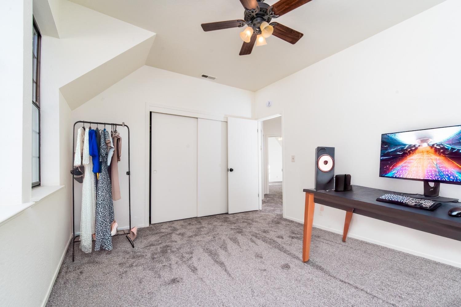 3961 7 Ridges Road Camino, CA 95709 - Photo 61 of 86 a view of a livingroom with furniture and a flat screen tv